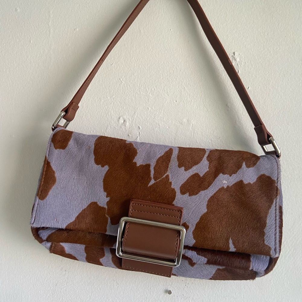 Purple faux cow hid shoulder bag